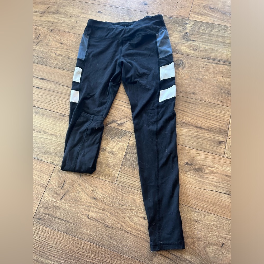 Avia black leggings with designs on the side size medium